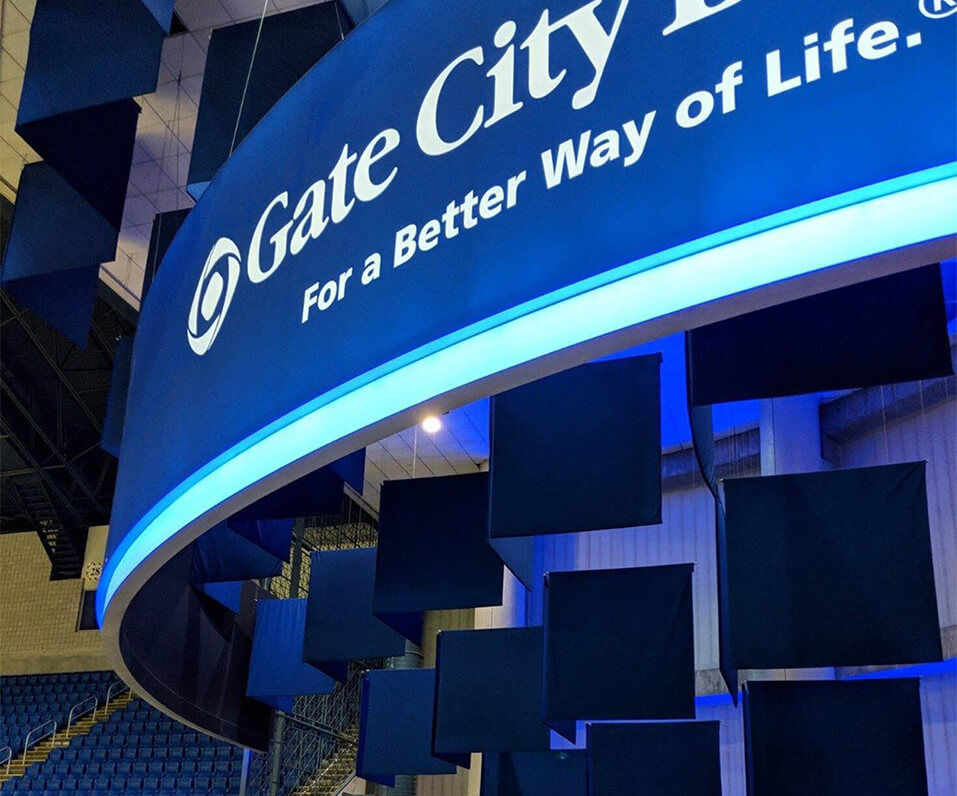 Gate City Bank RGB Illuminated Curved Signage in sponsorship corner in FargoDome ND 